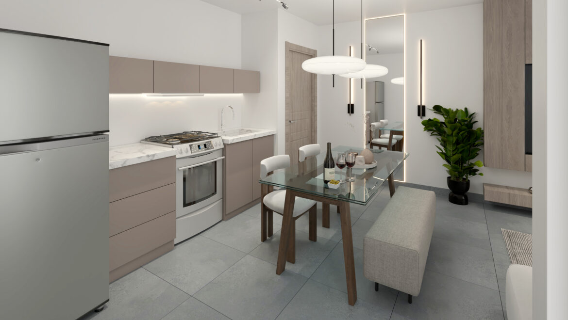 Modern open-plan kitchen with taupe cabinets, marble counters, stainless appliances, and a glass dining table in a living space.