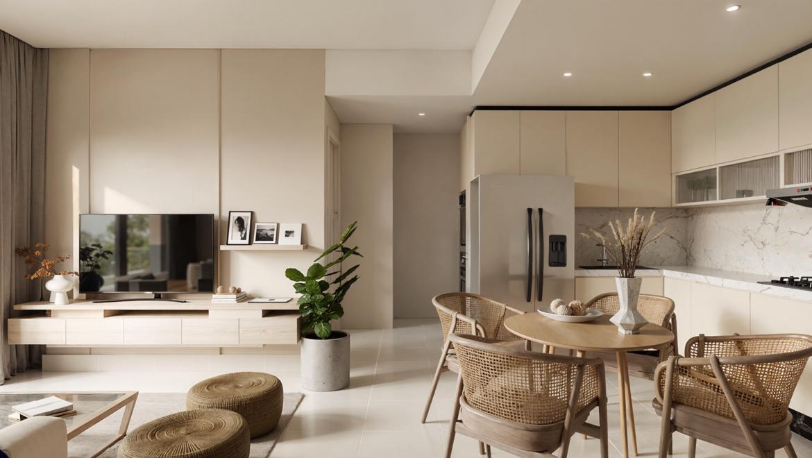 Open-plan living room and kitchen in neutral beige tones, with a TV on a wooden console, plant decor, and a round dining table with wicker chairs.