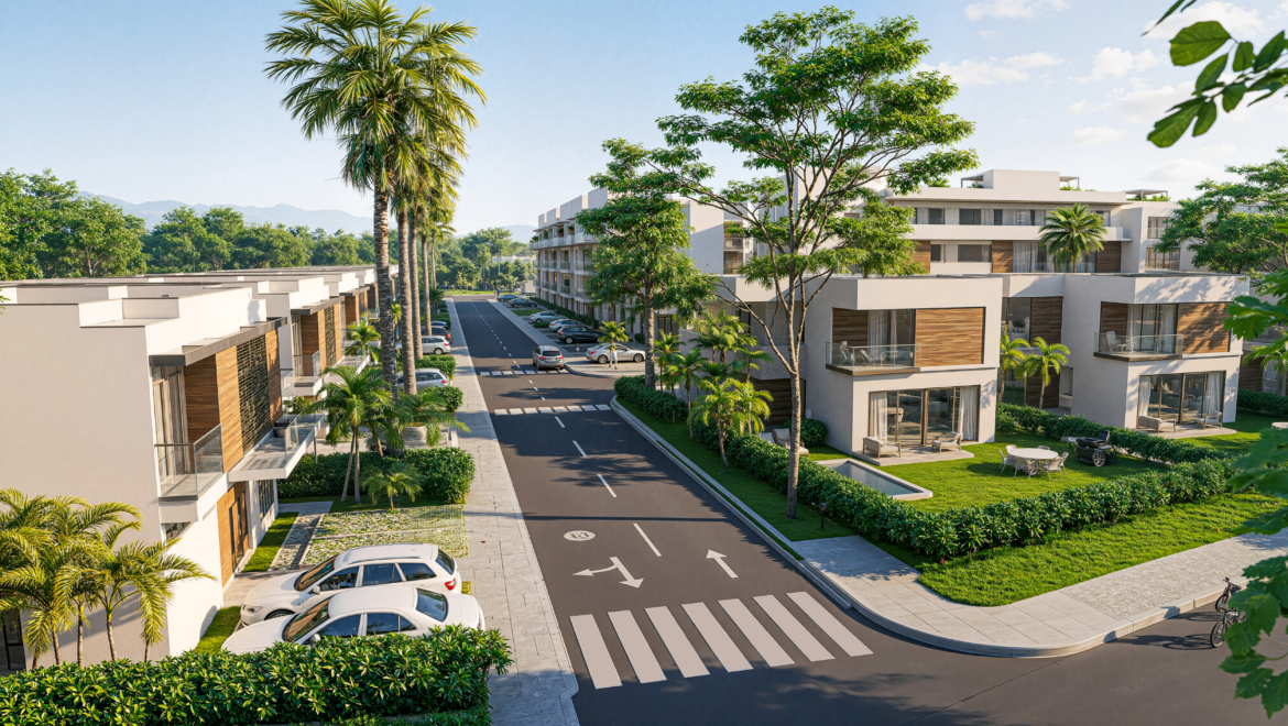 Sunlit modern apartment complex with white buildings, palm trees, and a tree-lined street with parked cars and green lawns at center stage.