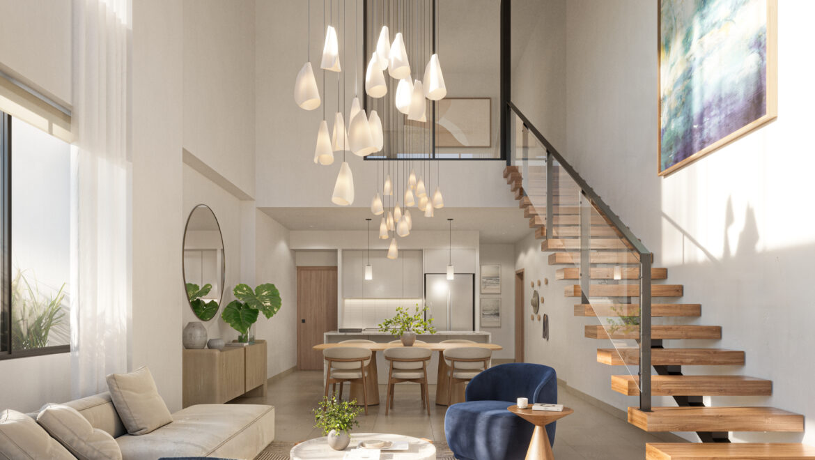 Bright, modern living area with a beige sectional, round coffee tables, and a wooden open staircase along the right; large abstract wall art and natural light.