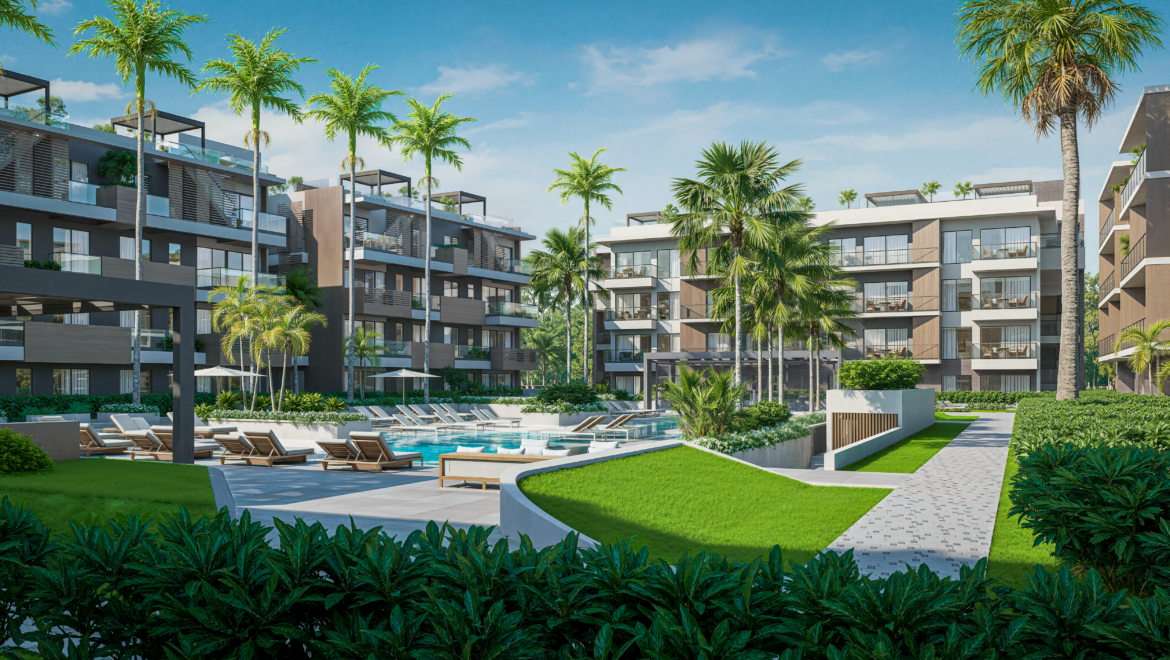 Modern apartment complex with a central pool, palm trees, and lounge chairs under a blue sky.