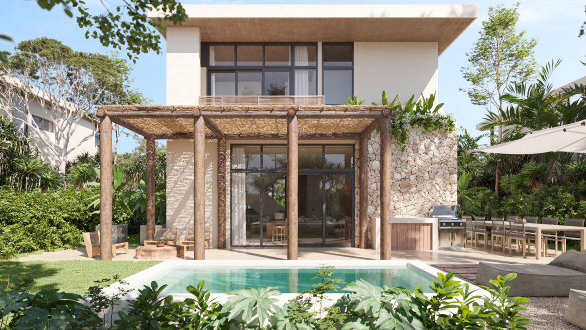 Modern two-story house with large glass windows, stone wall, and a wooden pergola over a poolside patio in a sunny backyard.
