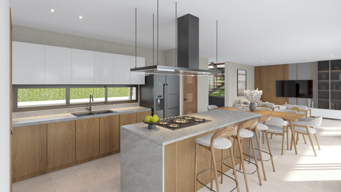 Open-plan kitchen with a central marble island, wooden lower cabinets, and a stainless steel range hood above the island closest to the dining area.