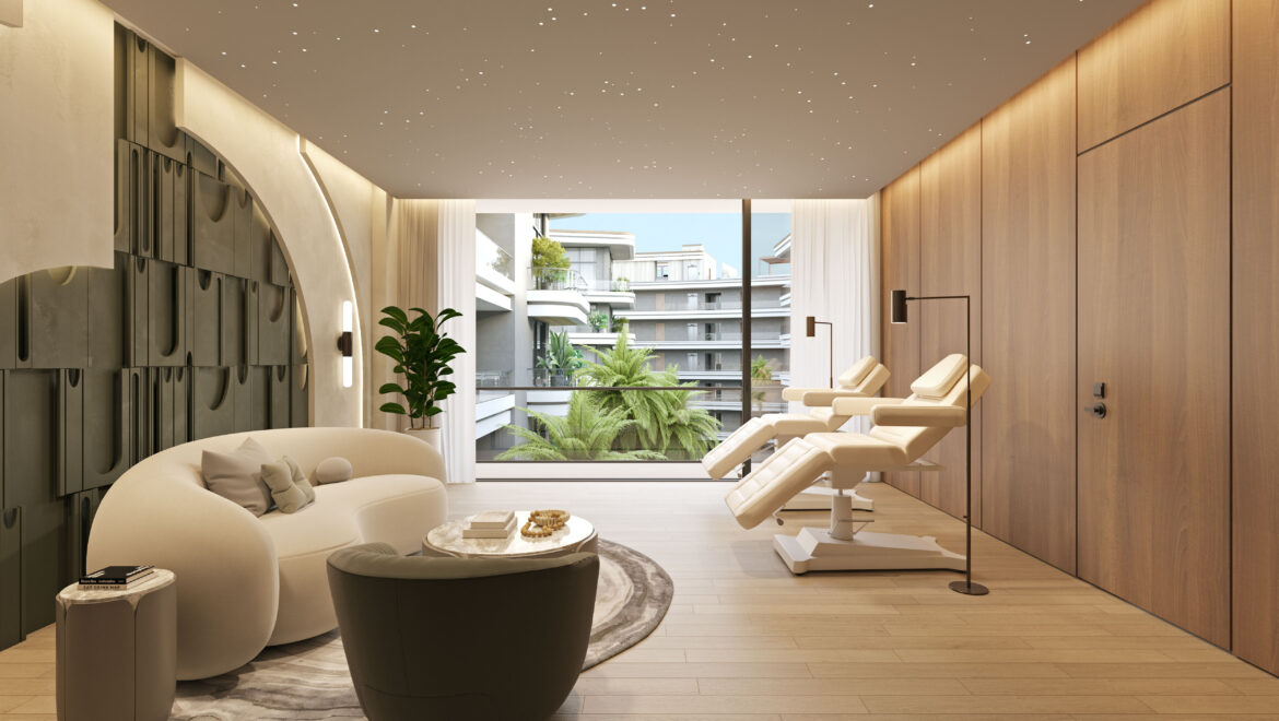 Luxurious spa lounge with curved white seating, wood-paneled walls, and a large glass wall overlooking a plant-filled courtyard.