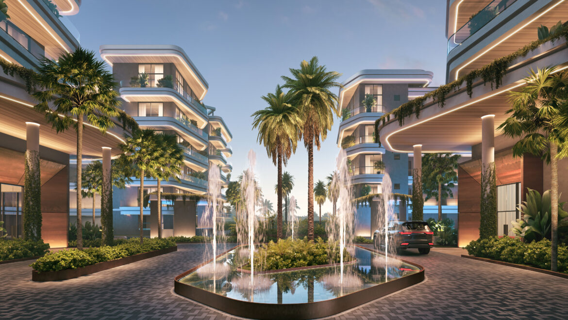 Modern residential complex with curved, illuminated balconies and palm trees surrounding a circular fountain pool at dusk