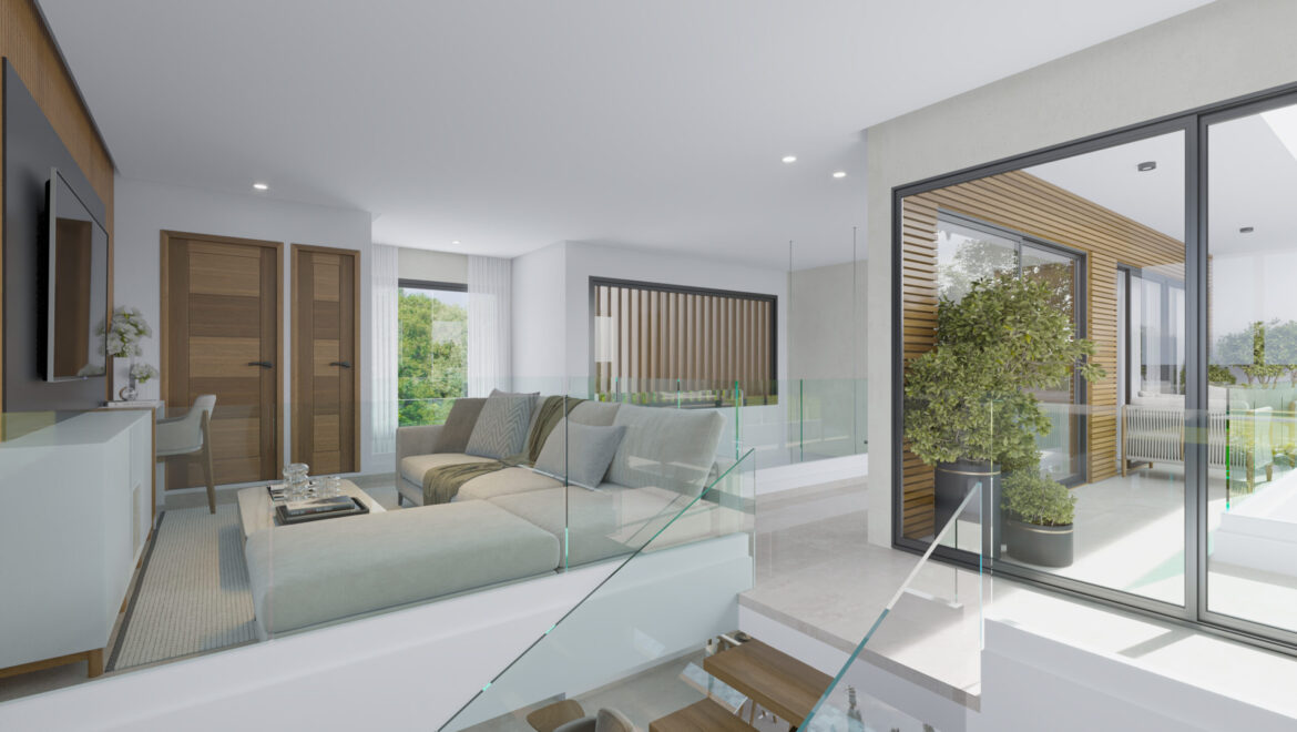 Open-plan living room with white furniture, glass railing, and large windows showing greenery outside.